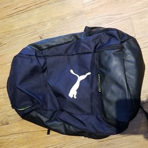 Puma navy/black backpack great condition lots zippered areas & side bottle mesh